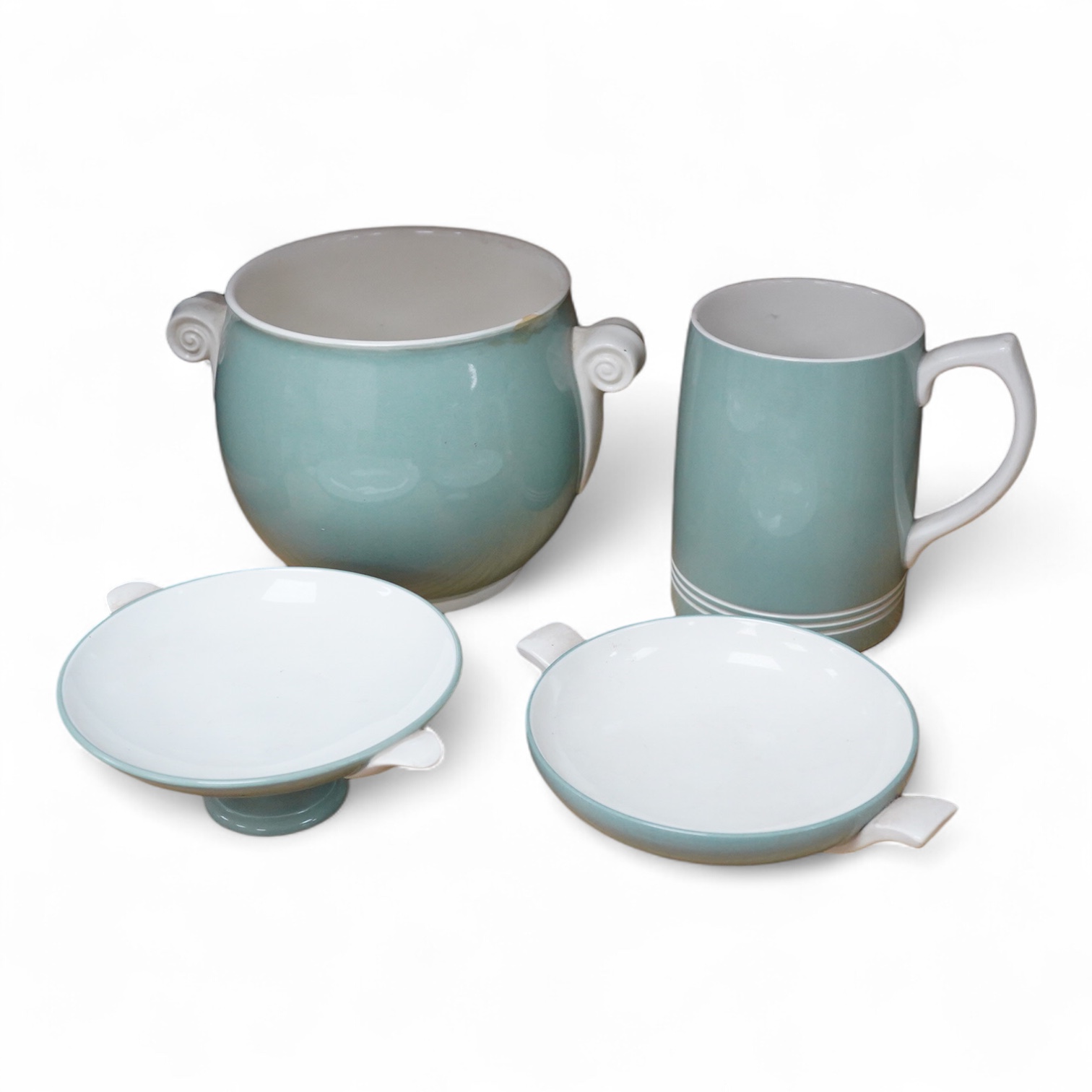 Keith Murray for Wedgwood - a celadon mug, two handled vase and two tazzas, tallest 13cm